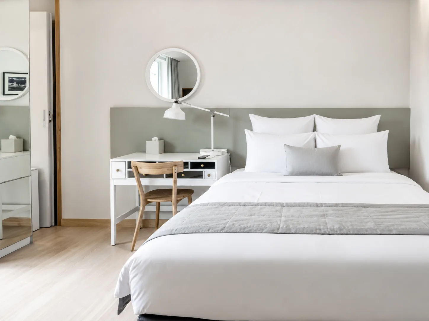Bedroom with queen bed and desk