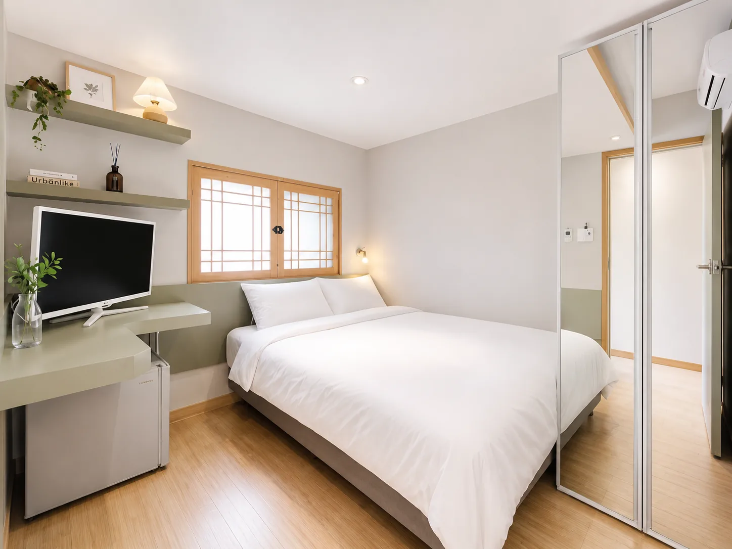 Bedroom with wardrobe and TV